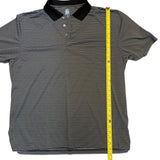 Black and white striped polo shirt with a measuring tape on a white background