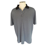 Black and white striped polo front of shirt on a mannequin against a white background