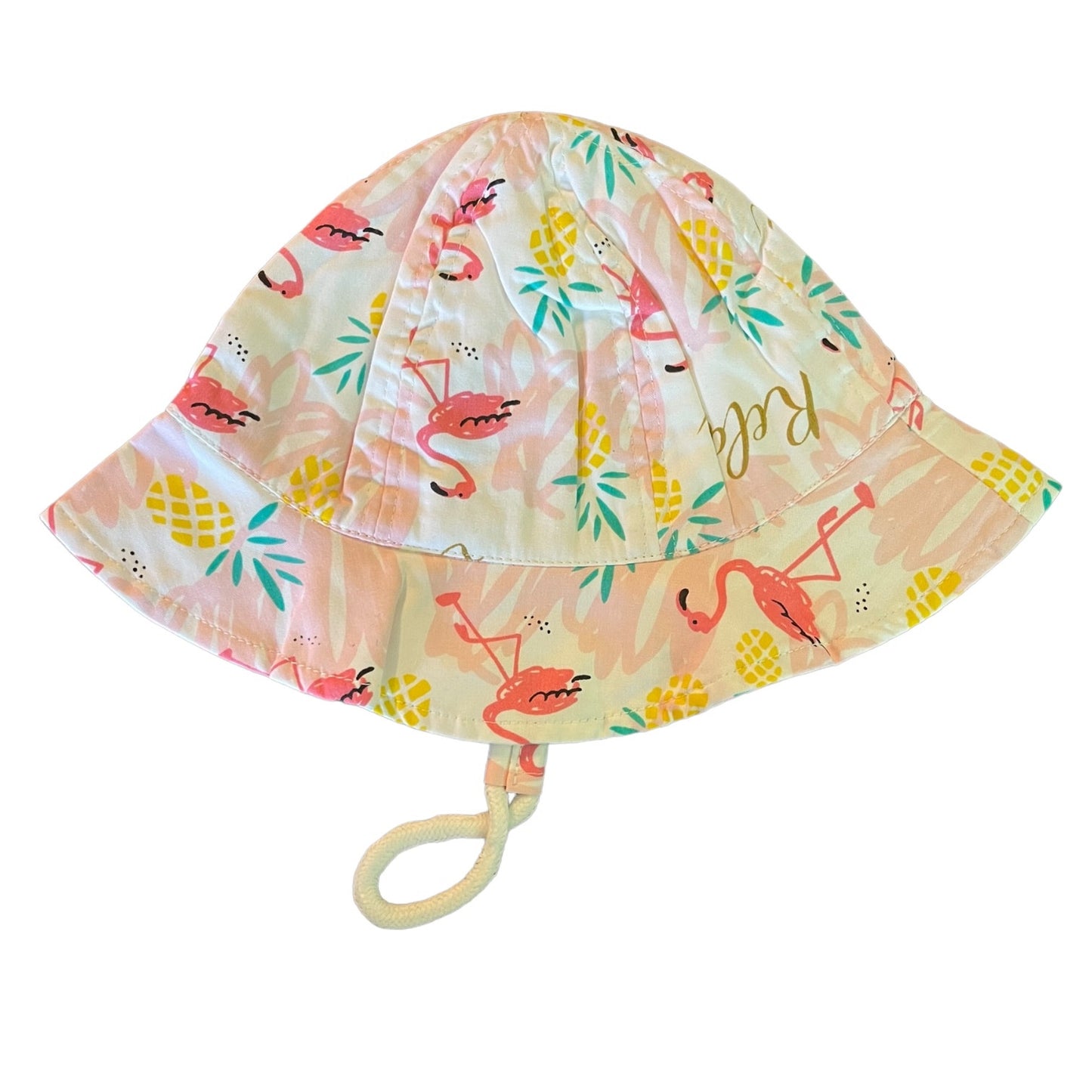 Sun hat with flamingo and pineapple pattern on a white background