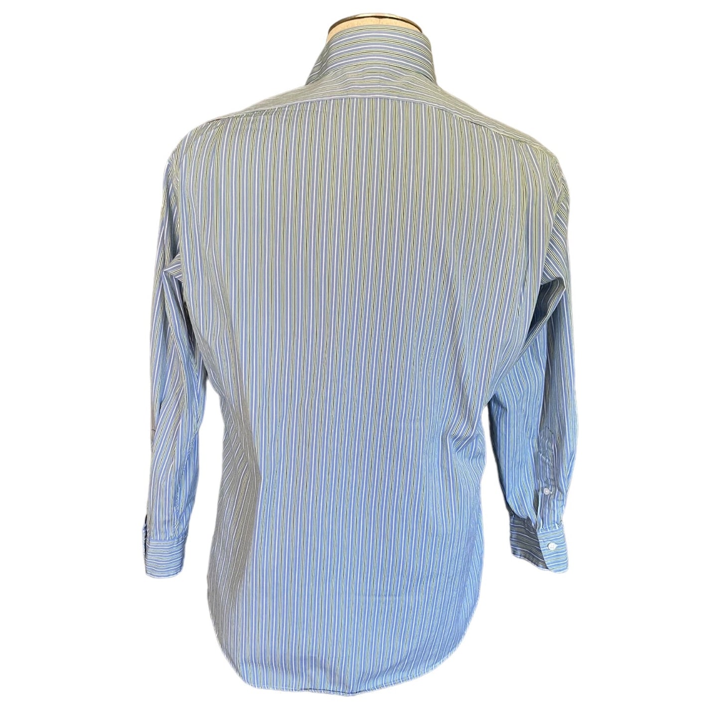Blue and white striped shirt on a mannequin with a white background