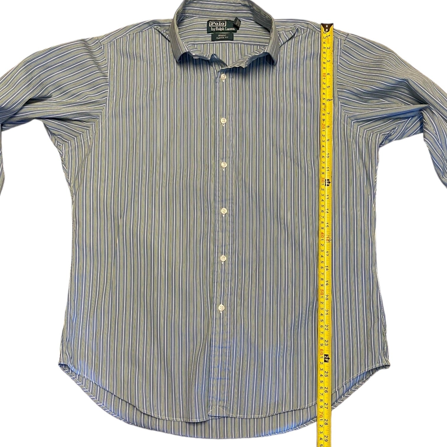 Striped shirt with a measuring tape on a white background