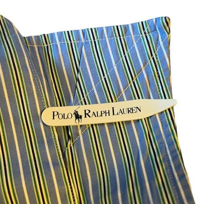Close-up of a striped fabric with a Polo Ralph Lauren logo collar stay.