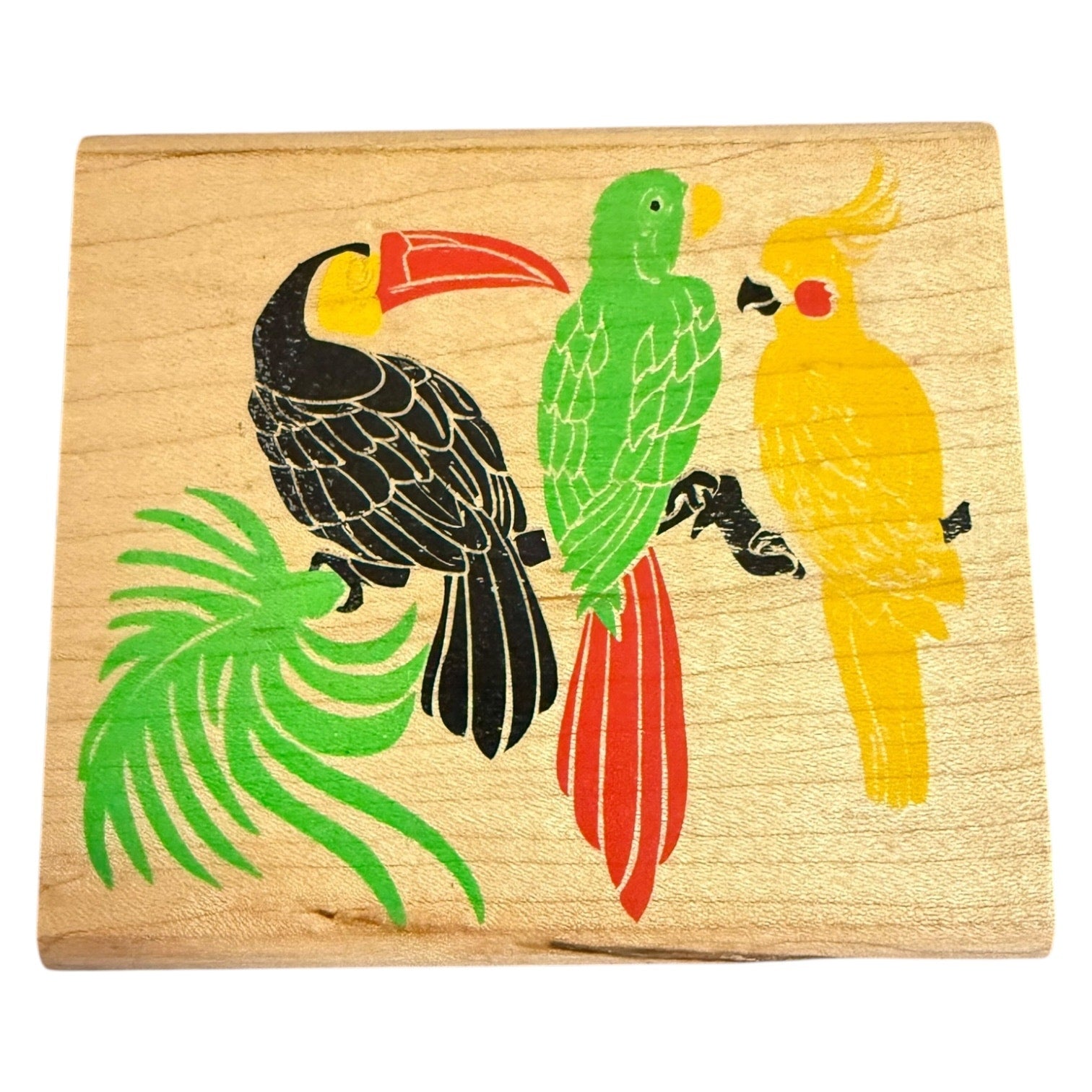 Wooden block with colorful parrot illustrations on a white background