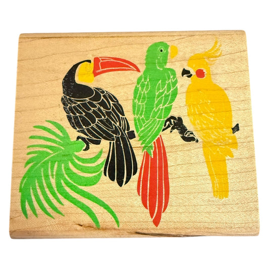 Wooden block with colorful parrot illustrations on a white background