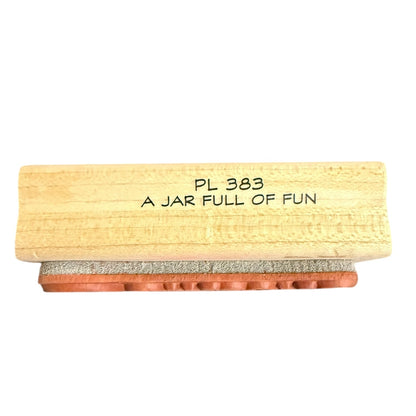 Side of wood stamp with PL383 A Jar Full of Fun on the side of it