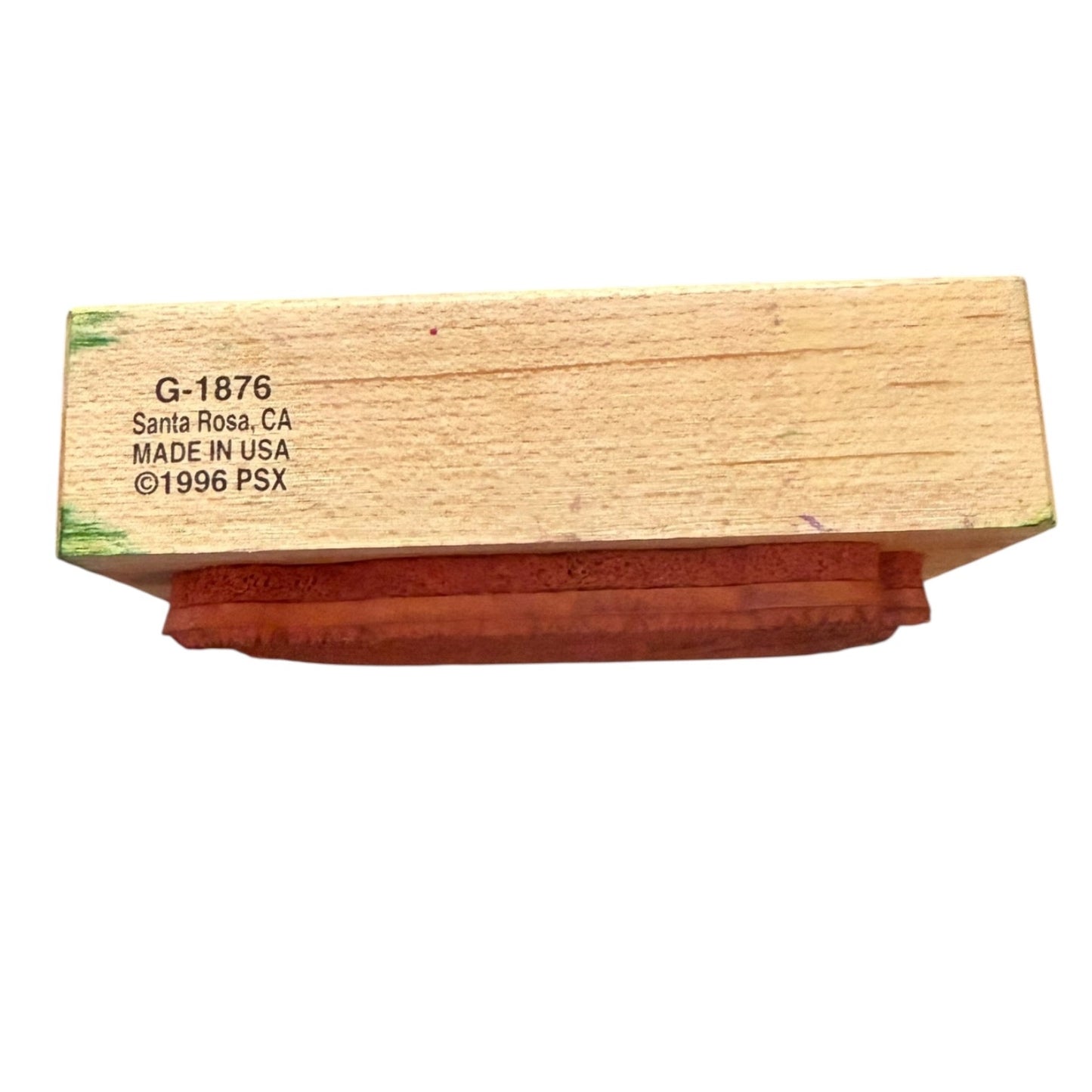 Wooden stamp block with branding text on a white background