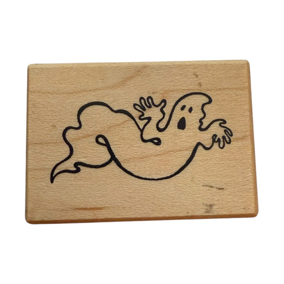 Wooden block with a ghost design on a white background