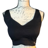 Front of Black sports bra on a mannequin with a white background