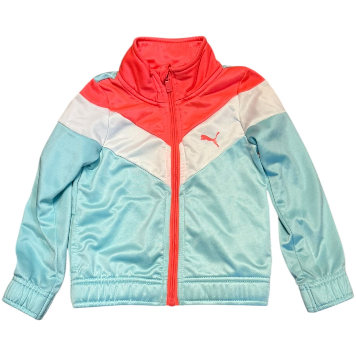 A Puma kids' zip-up jacket in a colorblock design of light blue, white, and coral red, shown flat on a white background.