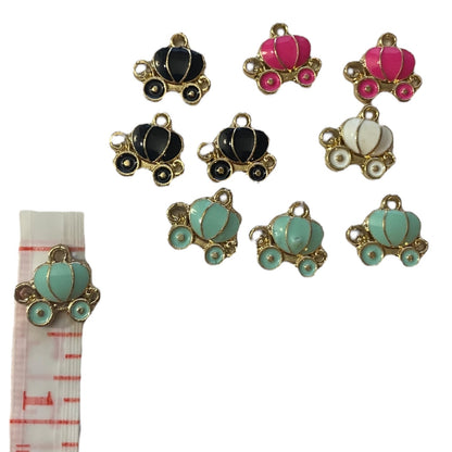 Colorful pumpkin carriage charms on a white background with measuring tape