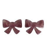 Purple bow earrings front