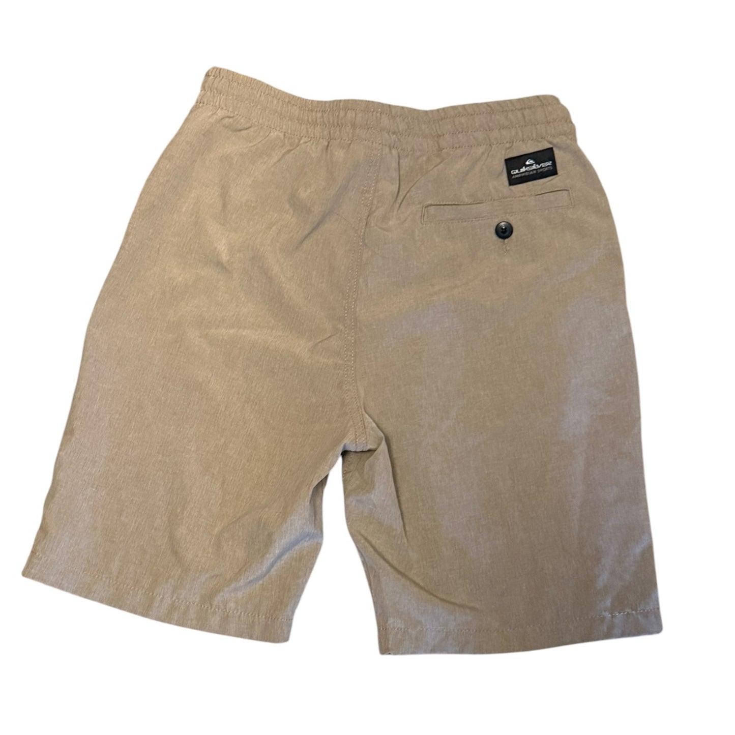 A pair of beige shorts with an elastic waistband, a back pocket with a button closure, and a small black brand label on the upper right side, shown against a plain white background.