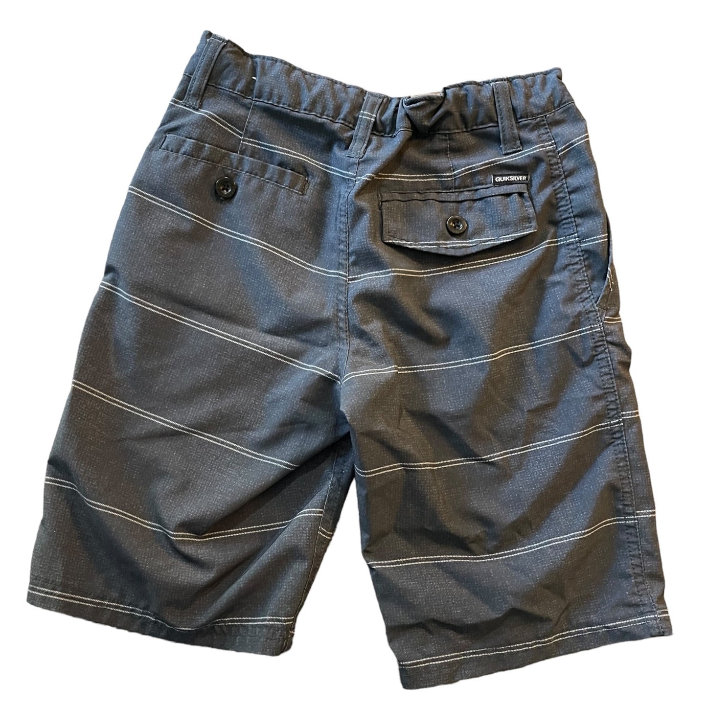 Back of gray striped shorts on a white background