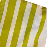 Close-up of a green and white striped fabric with issues shown