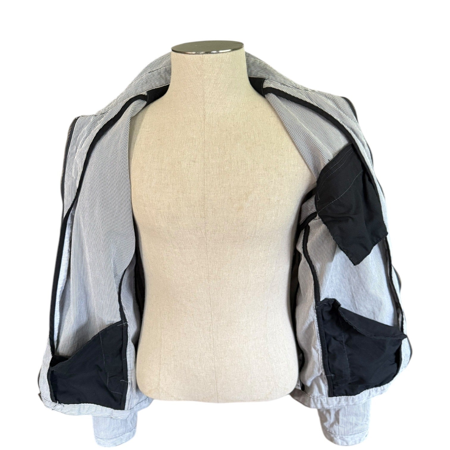 Interior of  jacket on a mannequin against a white background