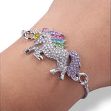 Rainbow unicorn bracelet on wrist