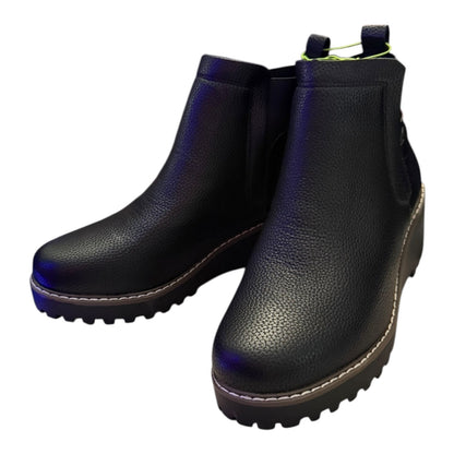 Pair of black faux leather ankle boots front side on a white background
