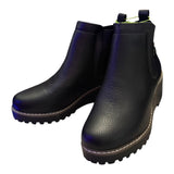 Pair of black faux leather ankle boots front side on a white background