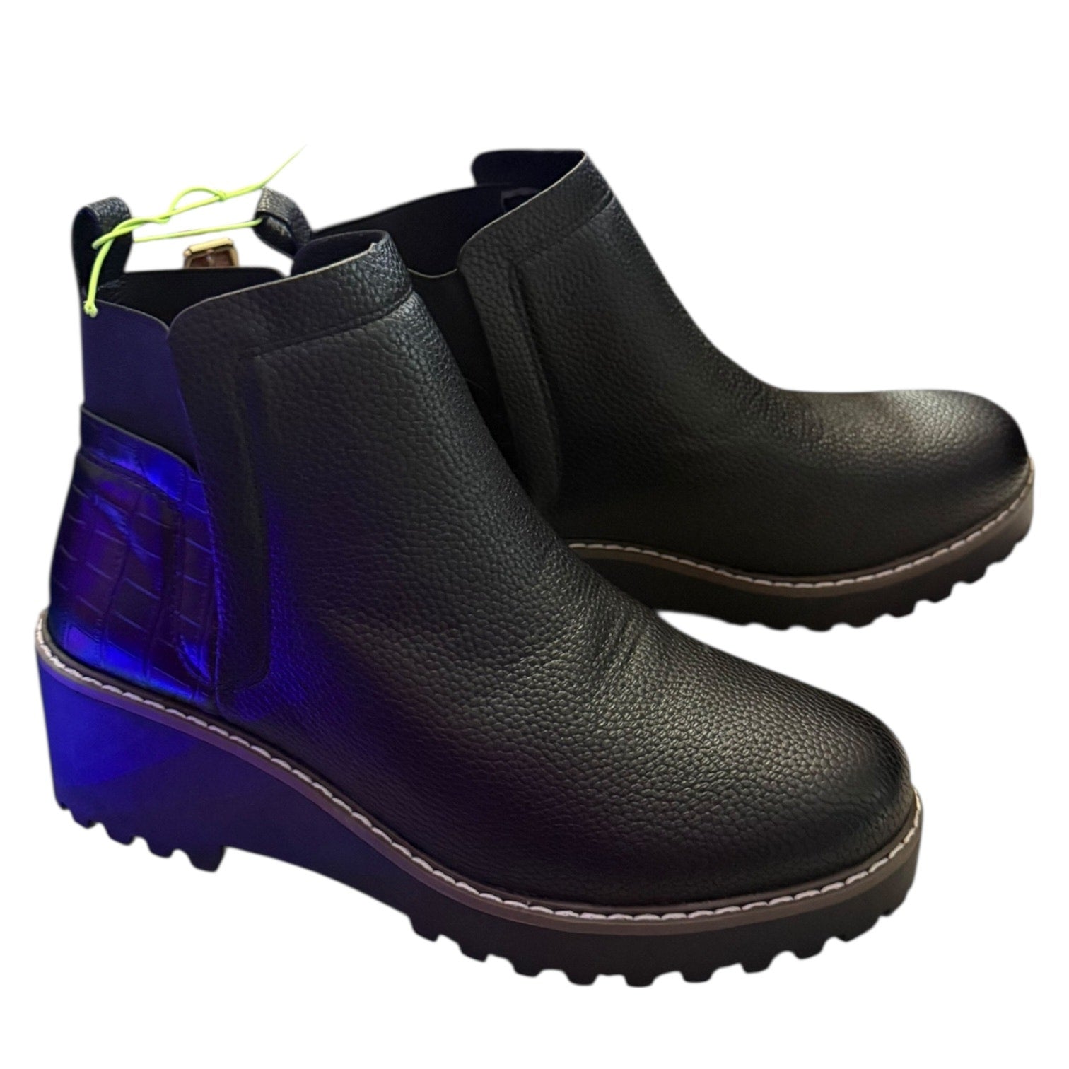Black ankle boots front side on a white background