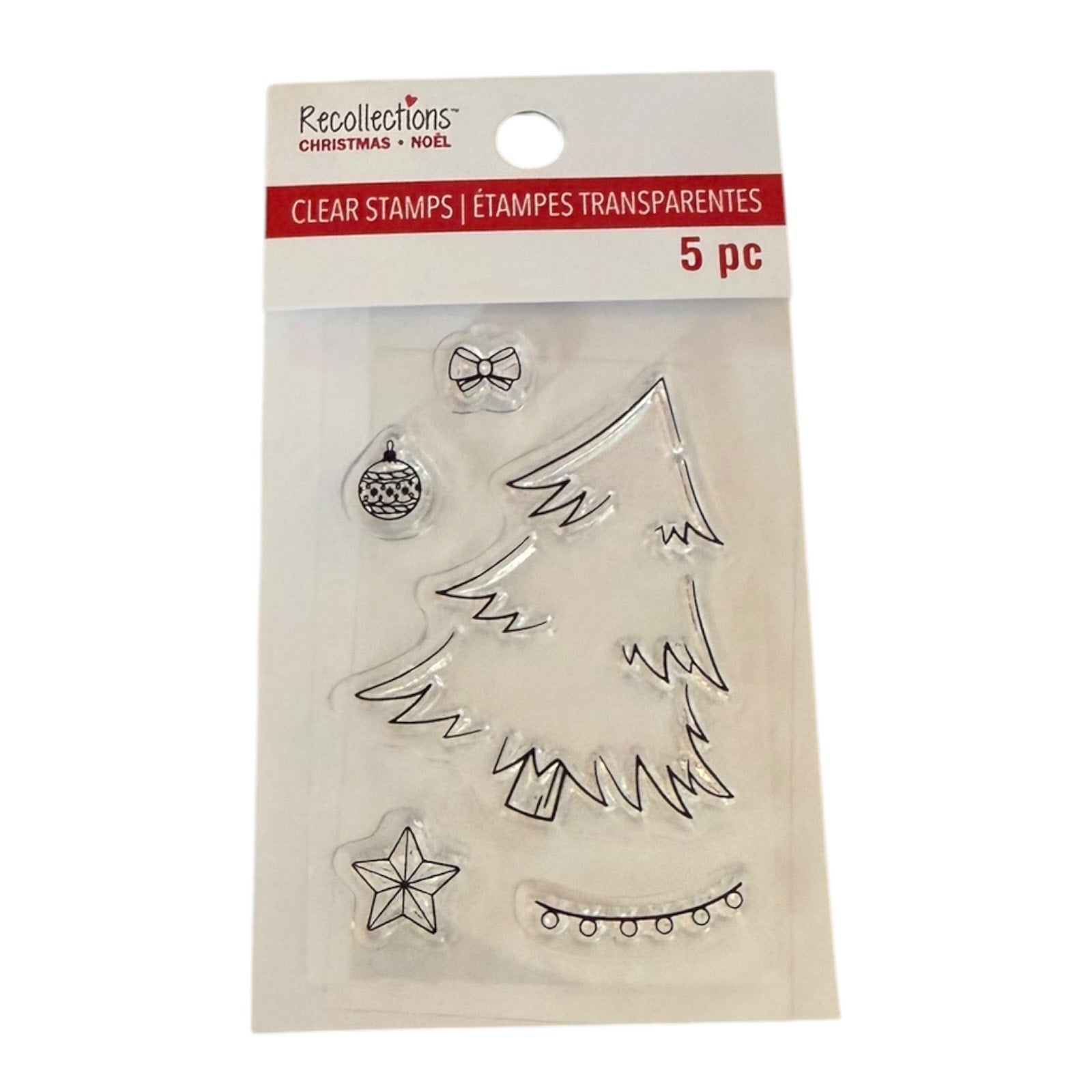 Recollections Christmas Clear Stamps set in its original retail packaging, featuring 5 transparent stamps with black outlines of a Christmas tree, ornaments, stars, and bows on a white backing card.
