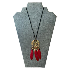 Full view of red feather necklace with black