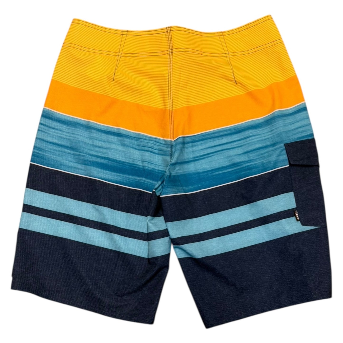 Multicolored striped board shorts with yellow, orange, blue, and navy stripes on a white background.