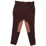 Brown riding pants with beige patches on a white background