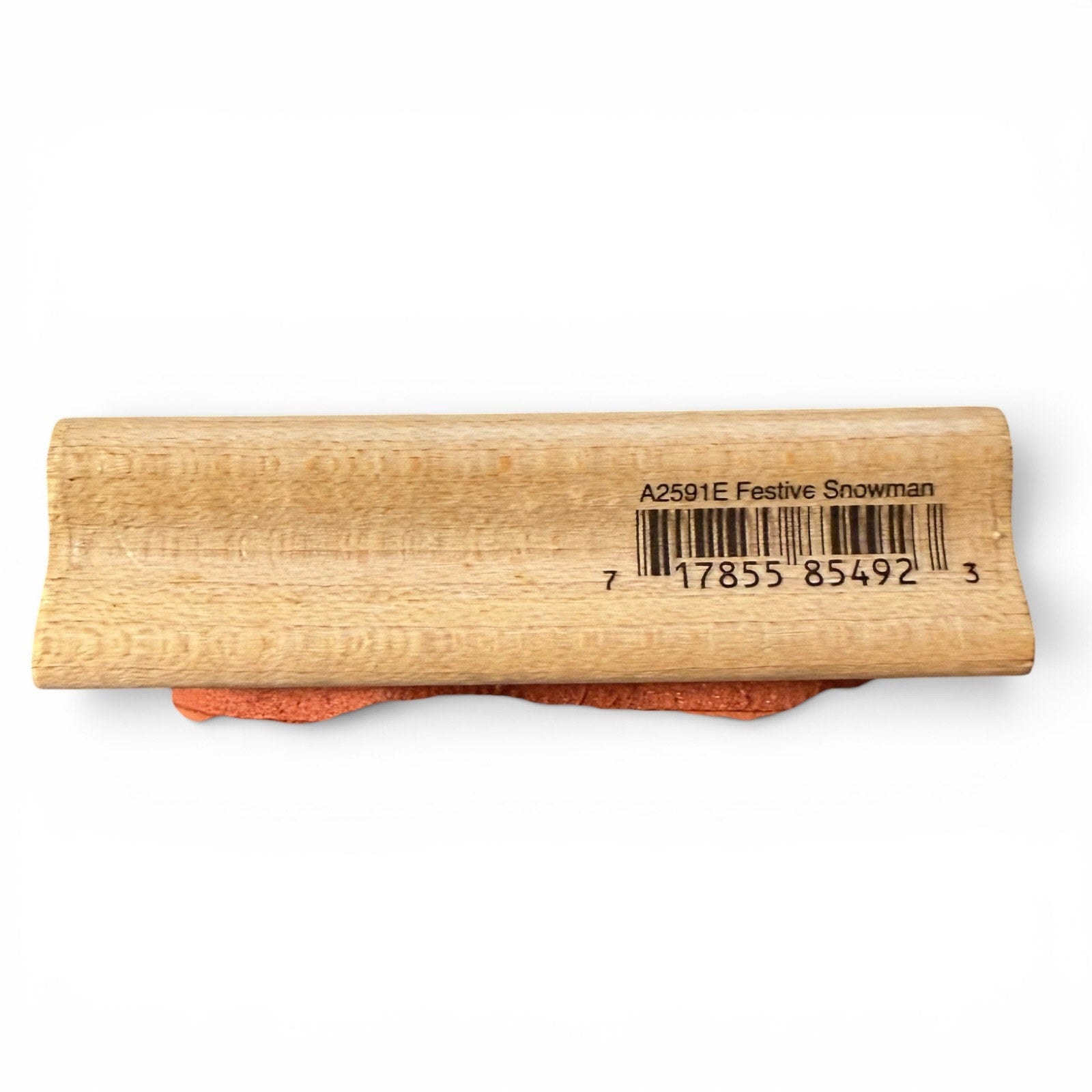 Wooden stamp with a barcode label on a white background