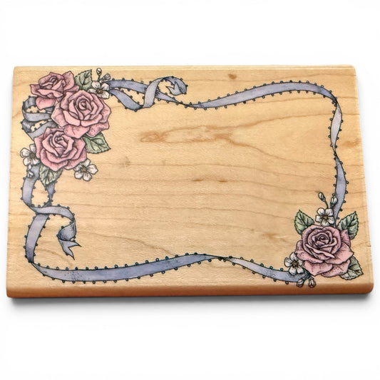 Wooden stamp with floral design on a white background