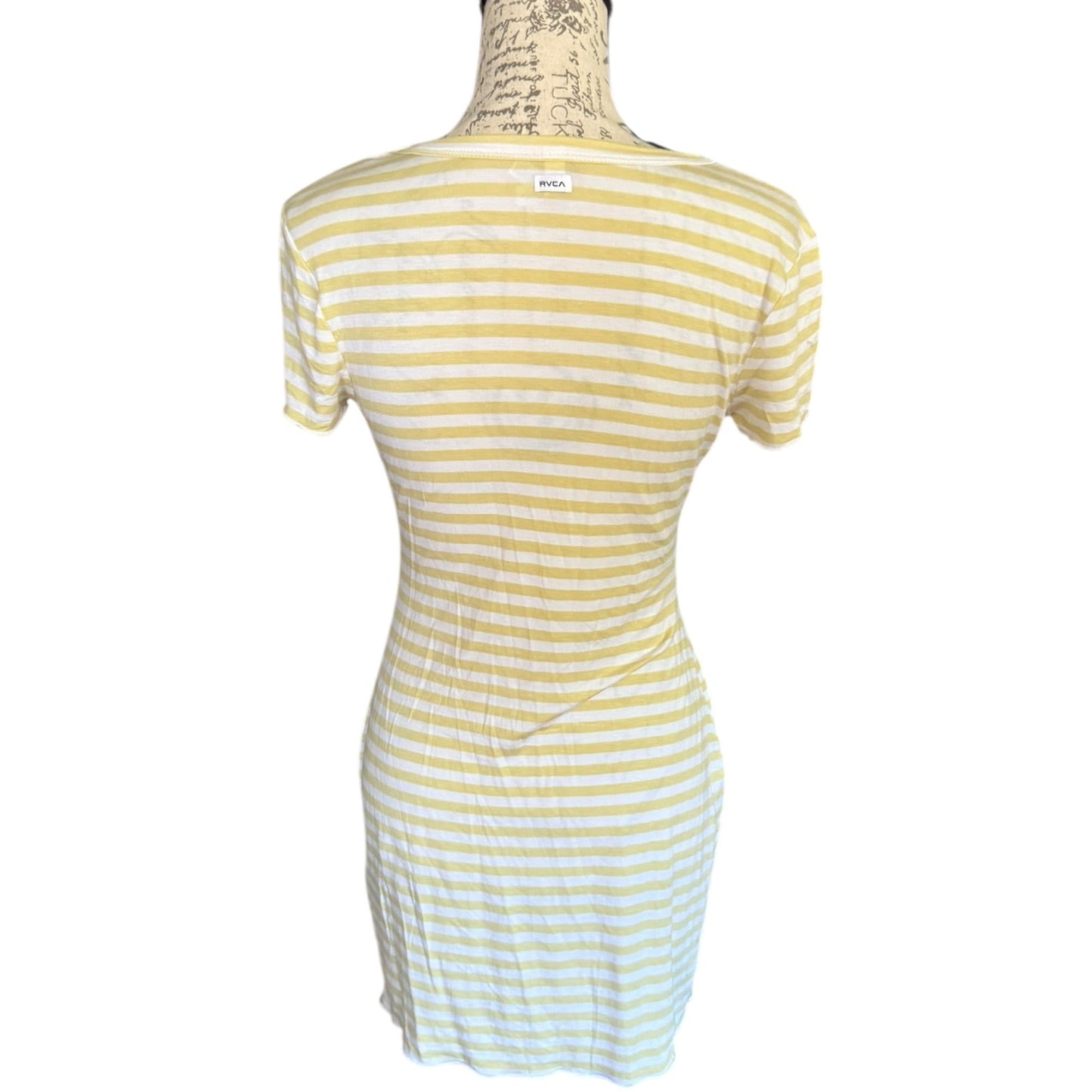 Back of green and white striped dress on a mannequin against a white background