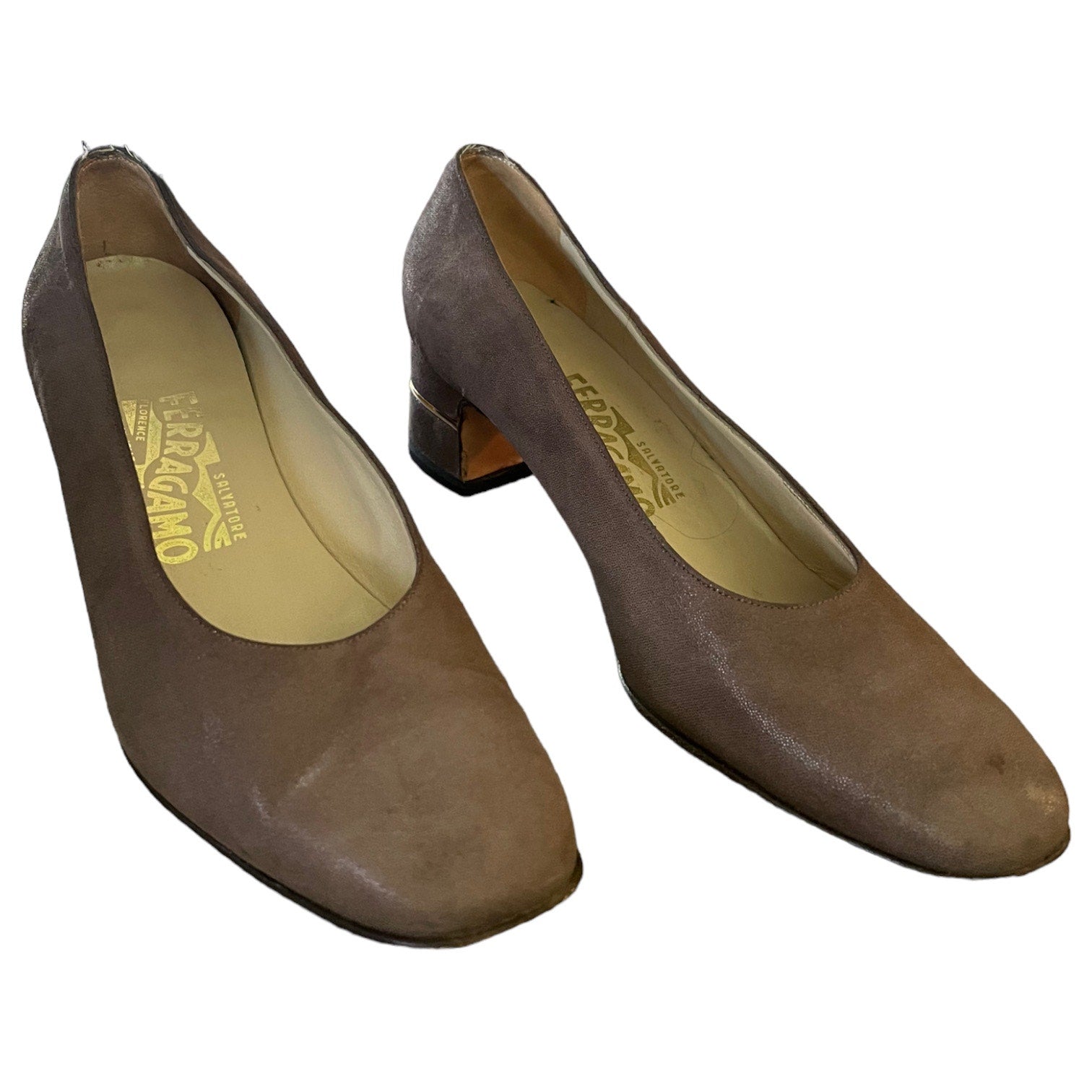 A pair of women's brown suede pumps with block heels, shown on a plain white background. 