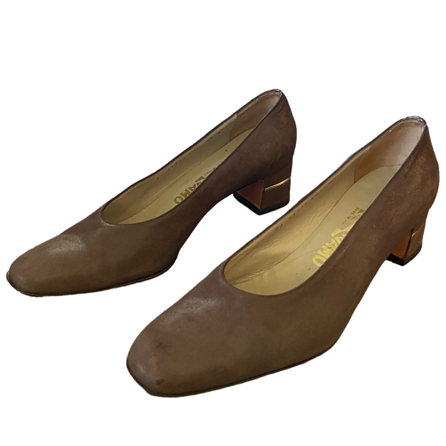 A pair of women's brown leather block-heel pumps with square toes, displayed on a clean white background.