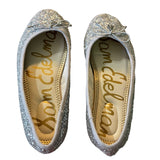 Top of silver glitter shoes