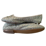 Side view silver glitter shoes