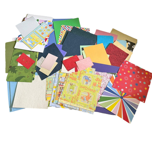 Assorted colorful card stock on a white background
