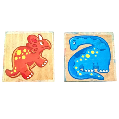 Two wooden stamps with colorful dinosaur designs on a white background