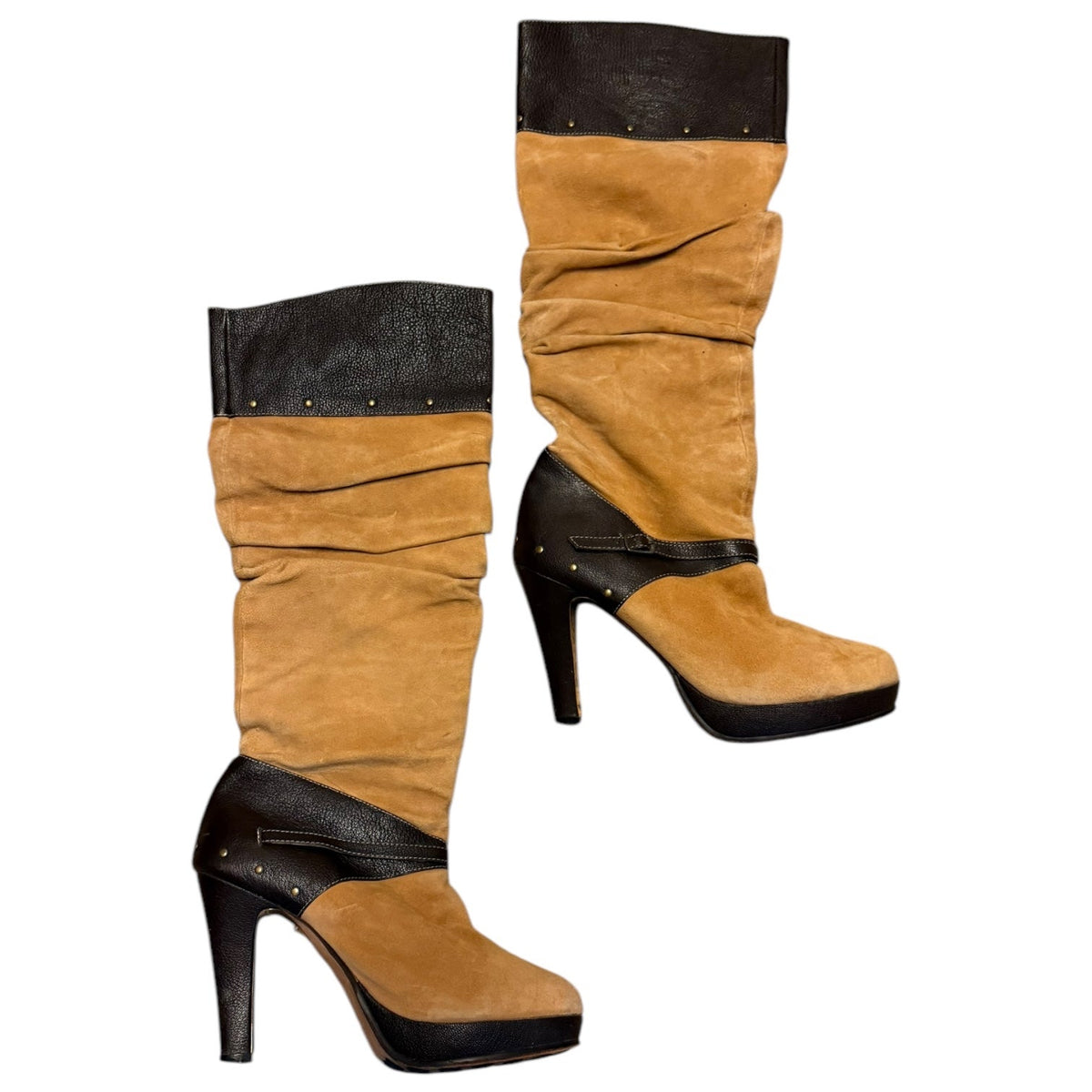 A pair of mid-calf heeled boots in tan suede and brown faux leather, featuring ruched detailing, studded trim, and platform soles, shown against a plain white background.