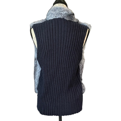 Back of Dark blue ribbed knit vest with fur trim on a mannequin against a white background