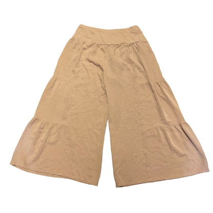 A pair ofgaucho pants with a wide waistband, laid flat on a white background.