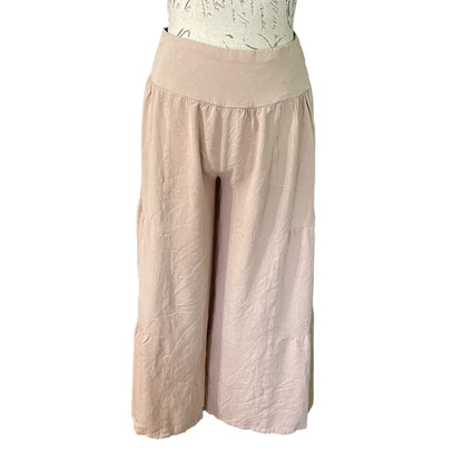 A pair of wide-leg cropped pants, displayed on a mannequin torso against a plain white background.