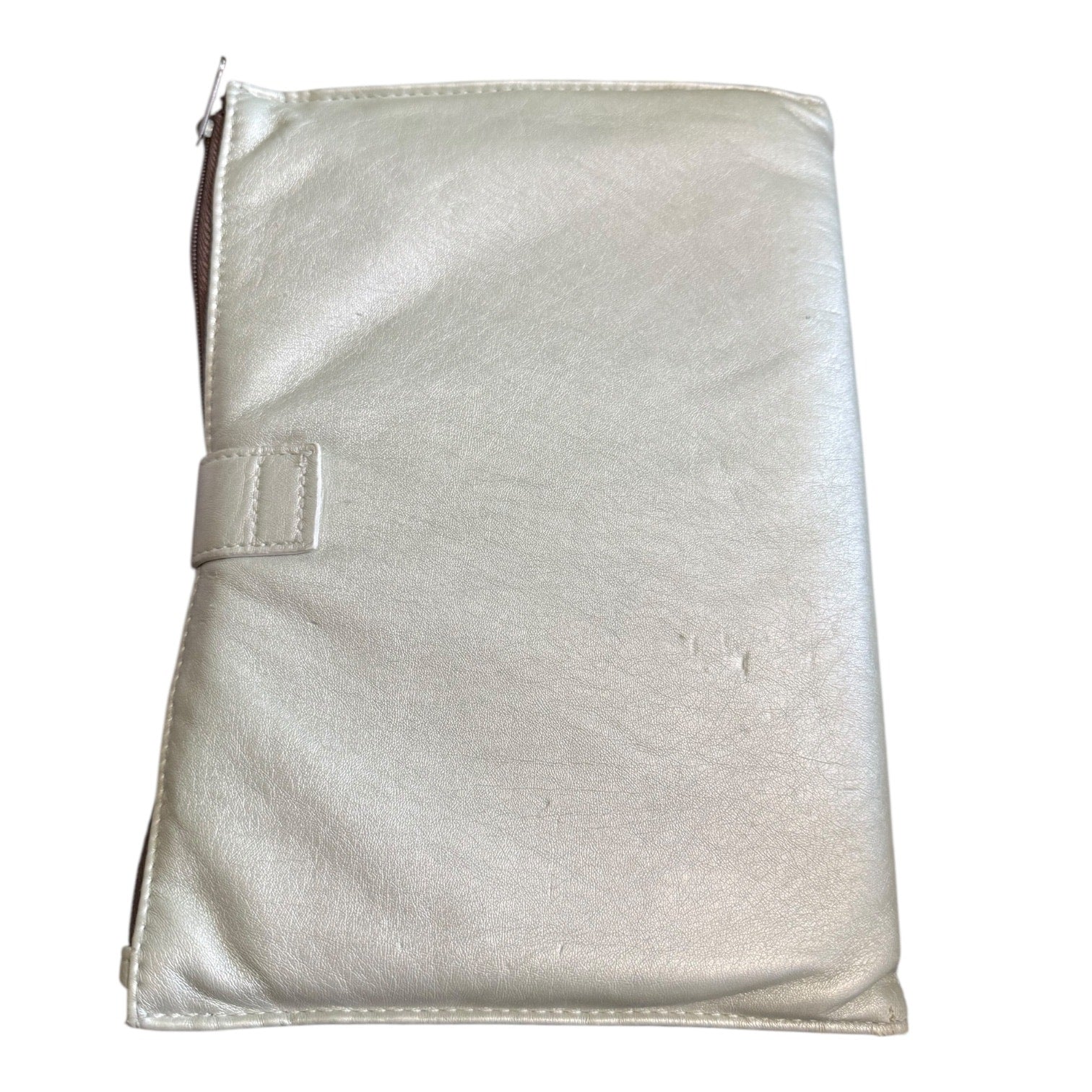 Back of journal cover with a zipper on a white background