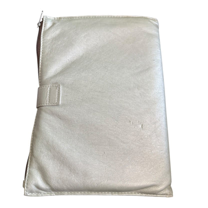 Back of journal cover with a zipper on a white background