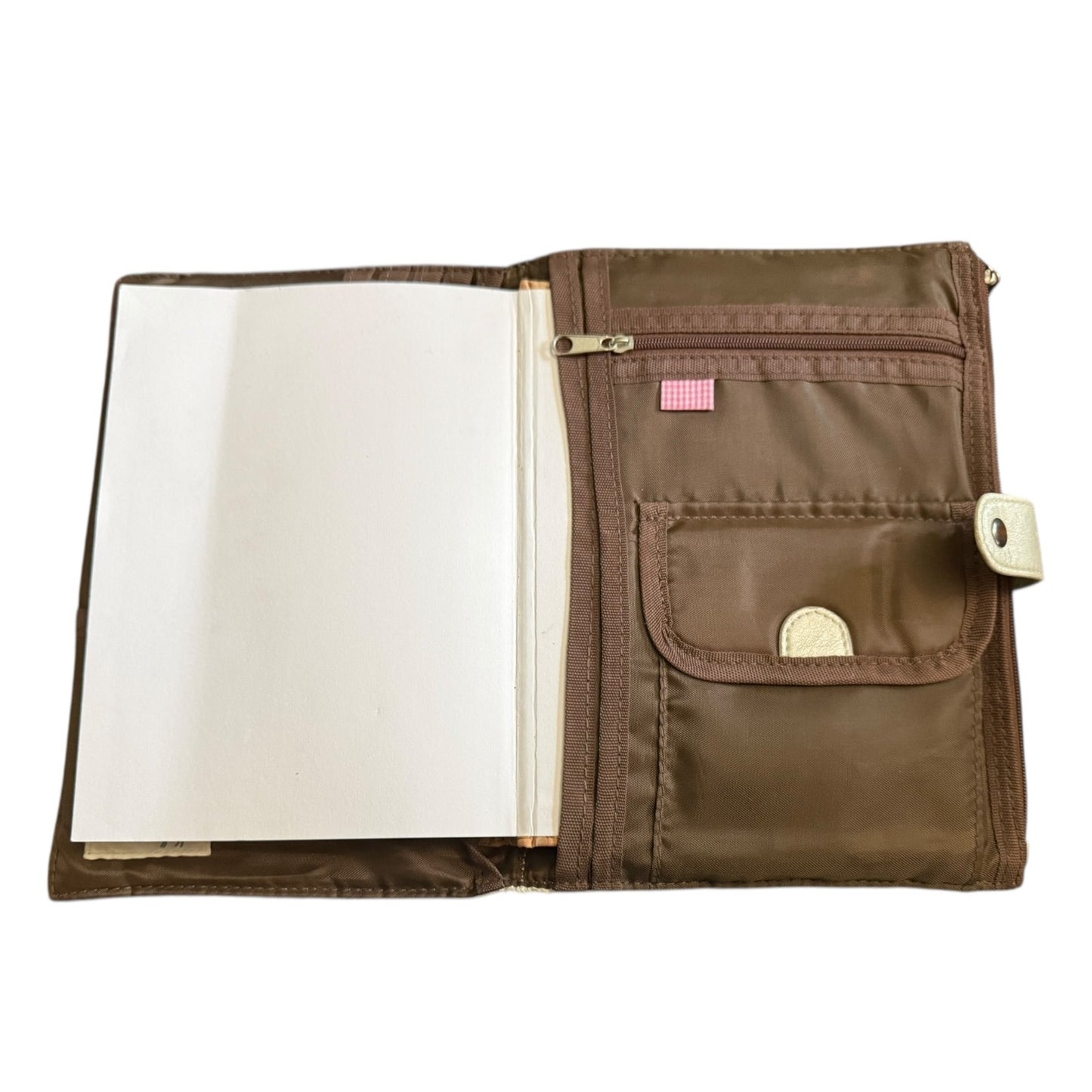 Interior of notebook cover with open pages on a white background