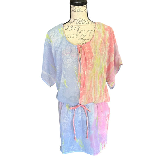 Pastel tie-dye outfit on a mannequin against a white background