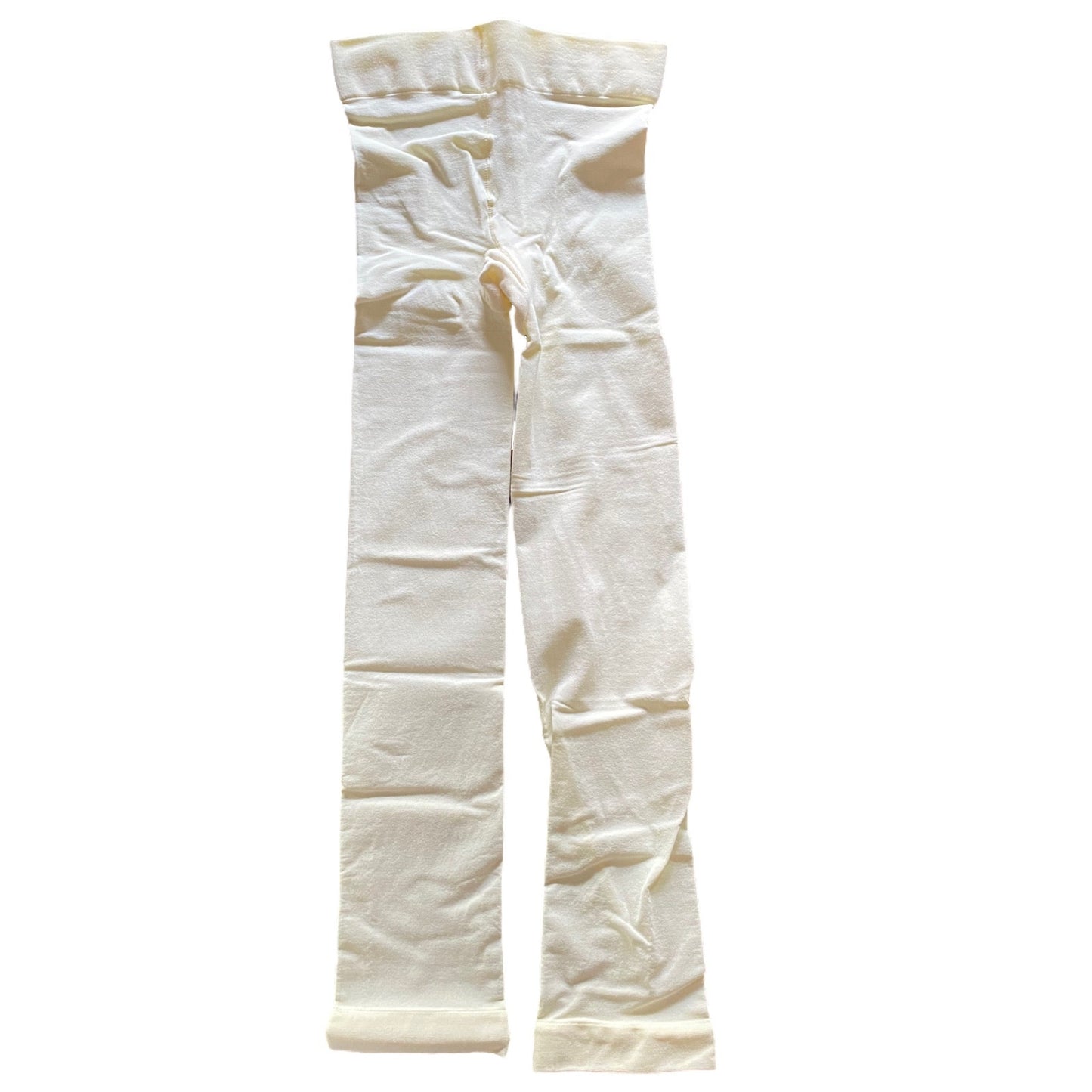 A pair of ivory colored tights laid flat against a solid white background.