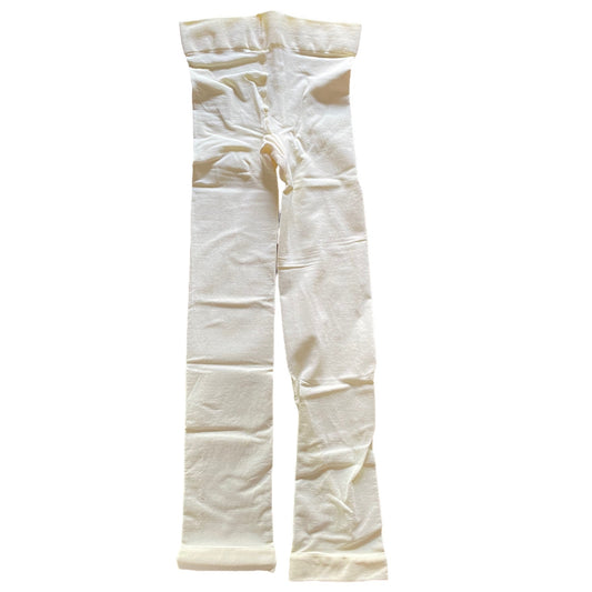 A pair of ivory colored tights laid flat against a solid white background.