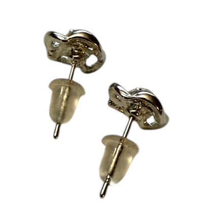 A pair of stud earrings with a small clear gemstone, shown from the side back to display the metal setting and backing, on a plain white background.