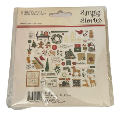 Simple Stories 61 cardstock die-cut ephemera bits and pieces in a clear plastic bag with a printed backing sheet featuring Christmas-themed cut outs.