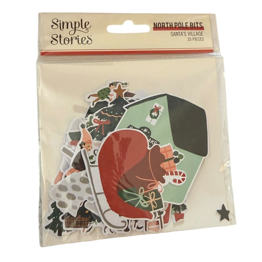 A package of Simple Stories 'Santa's Village' North Pole Bits scrapbooking paper pieces, containing 30 pieces in a clear plastic bag with a kraft header card.