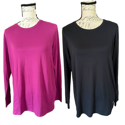 Two long-sleeve crewneck tops displayed on dress forms against a white background.